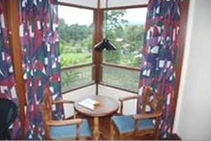 The furnitue in the rooms is placed o as to take advantage of th large windows. 